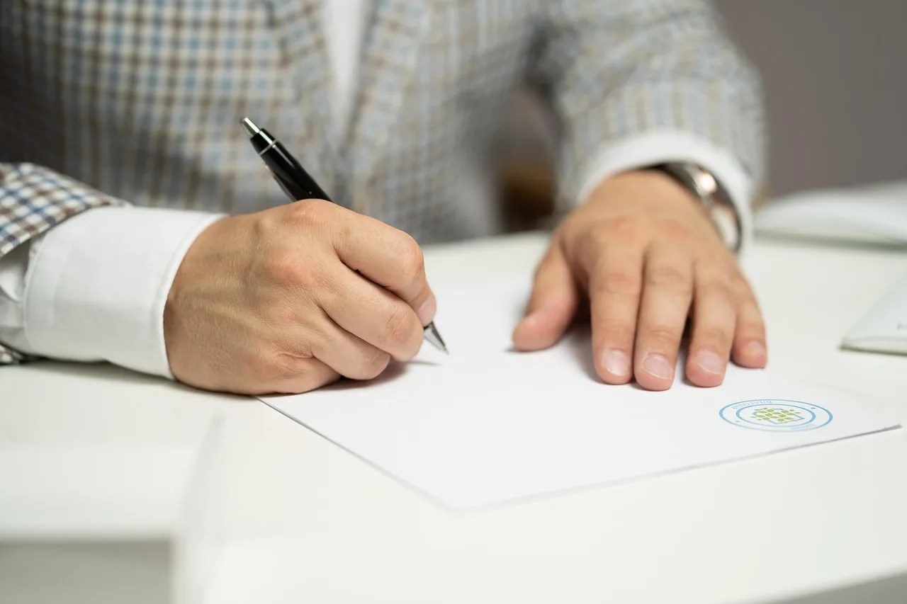 man, sign, paper, write, document, contract, signing, agreement, signature, signing document, signing contract, signing paper, sign, contract, contract, contract, contract, contract, signing, agreement, signature, signature. How to read a US commercial insurance policy, declarations to exclusions