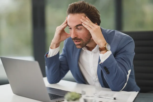 Business Man. Commercial insurance premium audit disputes: how to challenge a reclassification