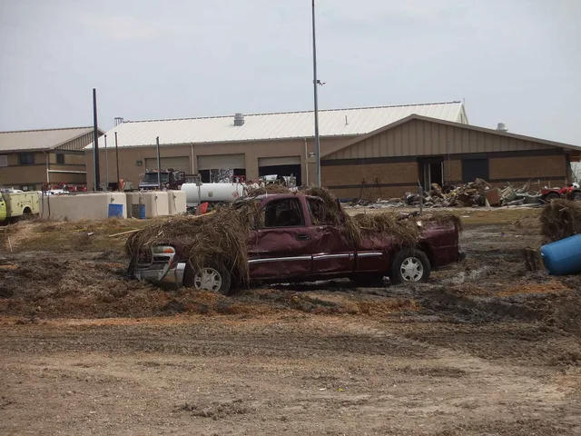 Image title: This truck and building sustained damage from the force of hurricane Image from Public domain images website, http://www.public-domain-image.com/full-image/events-happenings-public-domain-images-pictures/this-truck-and-building-sustained-damage-from-the-force-of-hurricane.jpg.html. Miami commercial property and business interruption coverage after a hurricane